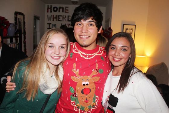 Mat, Amanda, and I at an Ugly Christmas Sweater Party last year. You can be sure I made an escape after an hour or so. (Photo: Fabian Fernandez)