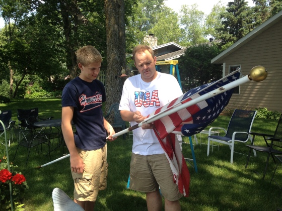 My dad and my cousin Jack setting up the flag pole. I took pictures of the action instead of helping...another sneaky tactic. (Photo: Abby O'Connor)